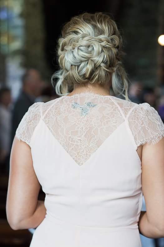 Braided updo for blonde bridesmaid, hair laurel Stratford wedding hairstylist, back view, bay of Islands nz